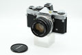 Olympus OM-2n + OLYMPUS ZUIKO 50mm & 135mm + Accessories