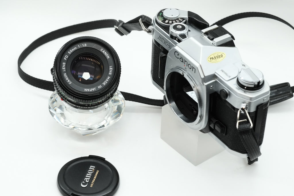 Canon AT-1 + Canon FD 50mm 1.8 + Canon 135mm + 70-210mm + Winder