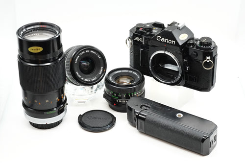 * EXCELLENT * Canon A-1 + Canon FD 50mm + Canon 28mm + 200mm NEW LIGHT SEALS