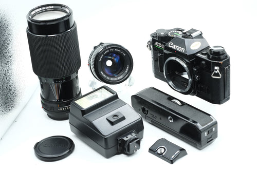 * Excellent * Canon AE-1 PROGRAM + FD Canon 50mm F/1.4  & 70-210 F/4 * New Light Seals