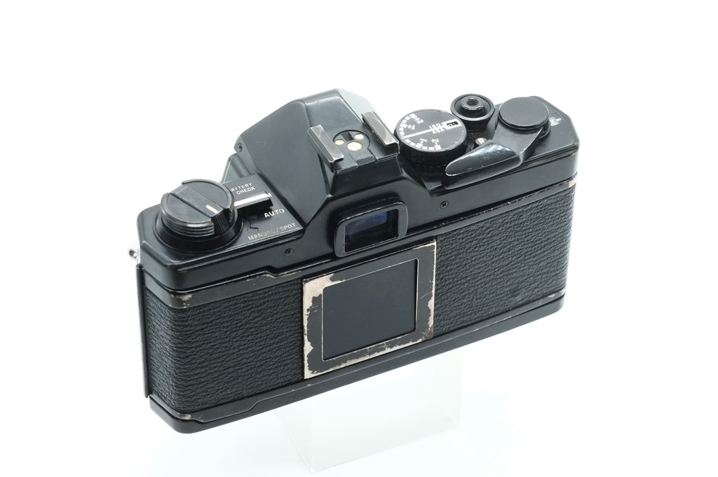 Olympus OM-2 Spot/Program + Olympus 50mm 1.4 + Olympus 28mm 2.8 + Olympus 135mm + Tokina 17mm