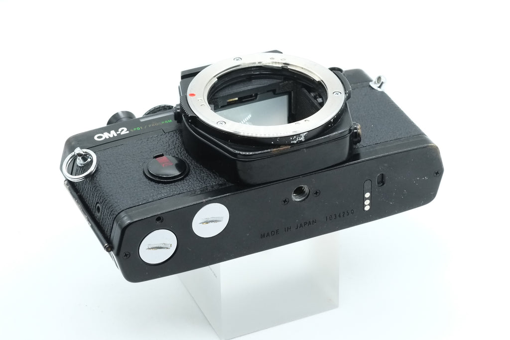Olympus OM-2 Spot/Program + Olympus 50mm 1.4 + Olympus 28mm 2.8 + Olympus 135mm + Tokina 17mm