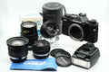 Olympus OM-2 Spot/Program + Olympus 50mm 1.4 + Olympus 28mm 2.8 + Olympus 135mm + Tokina 17mm