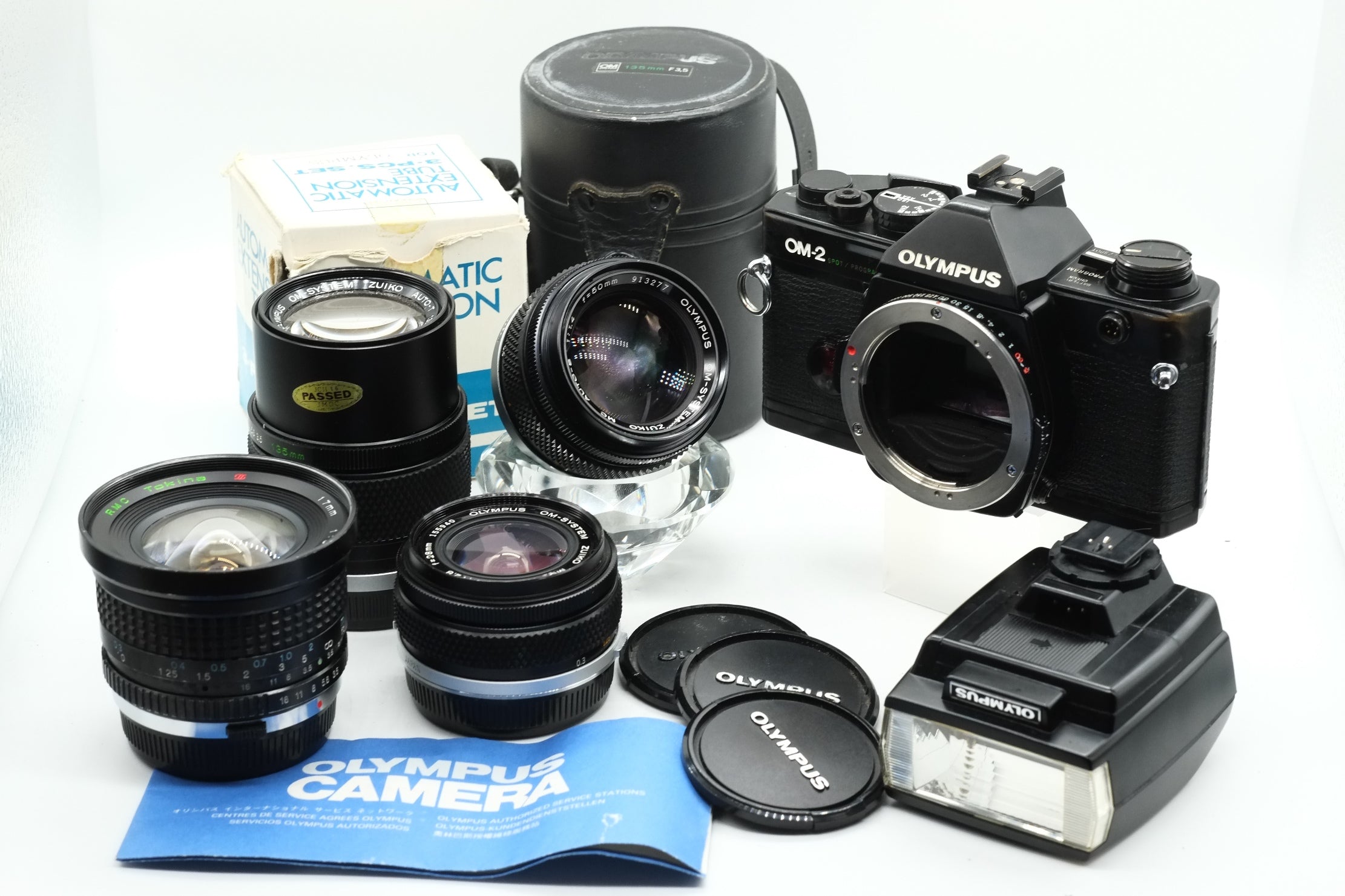 Olympus OM-2 Spot/Program + Olympus 50mm 1.4 + Olympus 28mm 2.8 + Olympus 135mm + Tokina 17mm