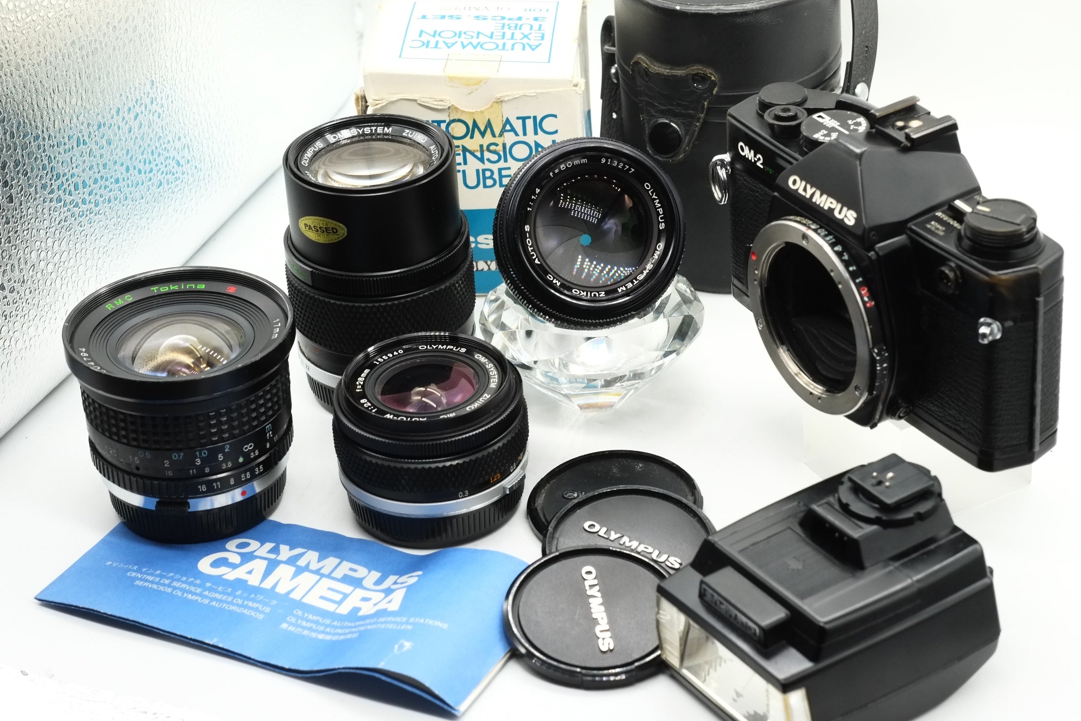 Olympus OM-2 Spot/Program + Olympus 50mm 1.4 + Olympus 28mm 2.8 + Olympus 135mm + Tokina 17mm