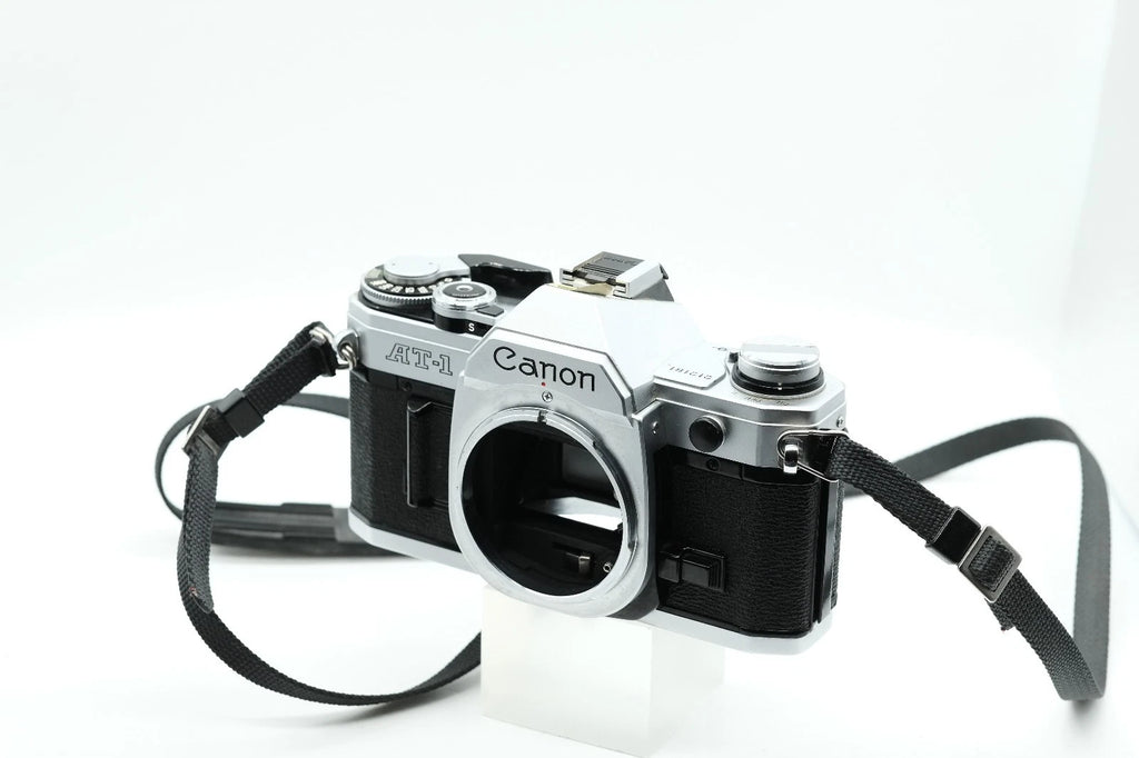 Canon AT-1 + Canon FD 50mm 1.8 + Canon 135mm + 70-210mm + Winder