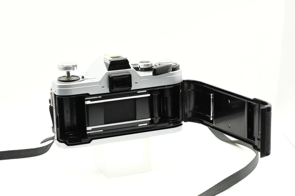 Canon AT-1 + Canon FD 50mm 1.8 + Canon 135mm + 70-210mm + Winder